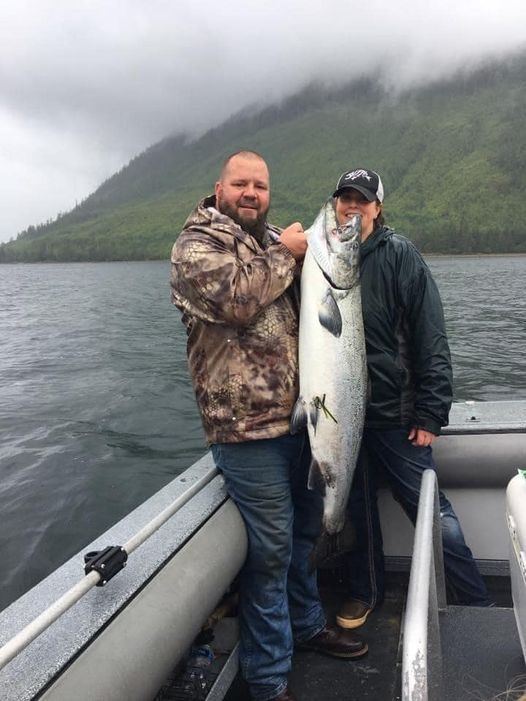 Two anglers aboard the charter boat with a king salmon caught off Prince of Wales Island